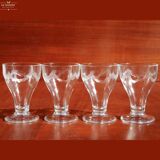 4 large water glasses or Evian ice cream cups