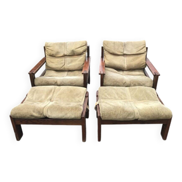 Set of 4 brown leather and wood armchairs with footstools, vintage 1960s style.
