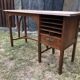 Old oak desk with curved wooden sleepers in the Art Nouveau spirit of the early 20th century.