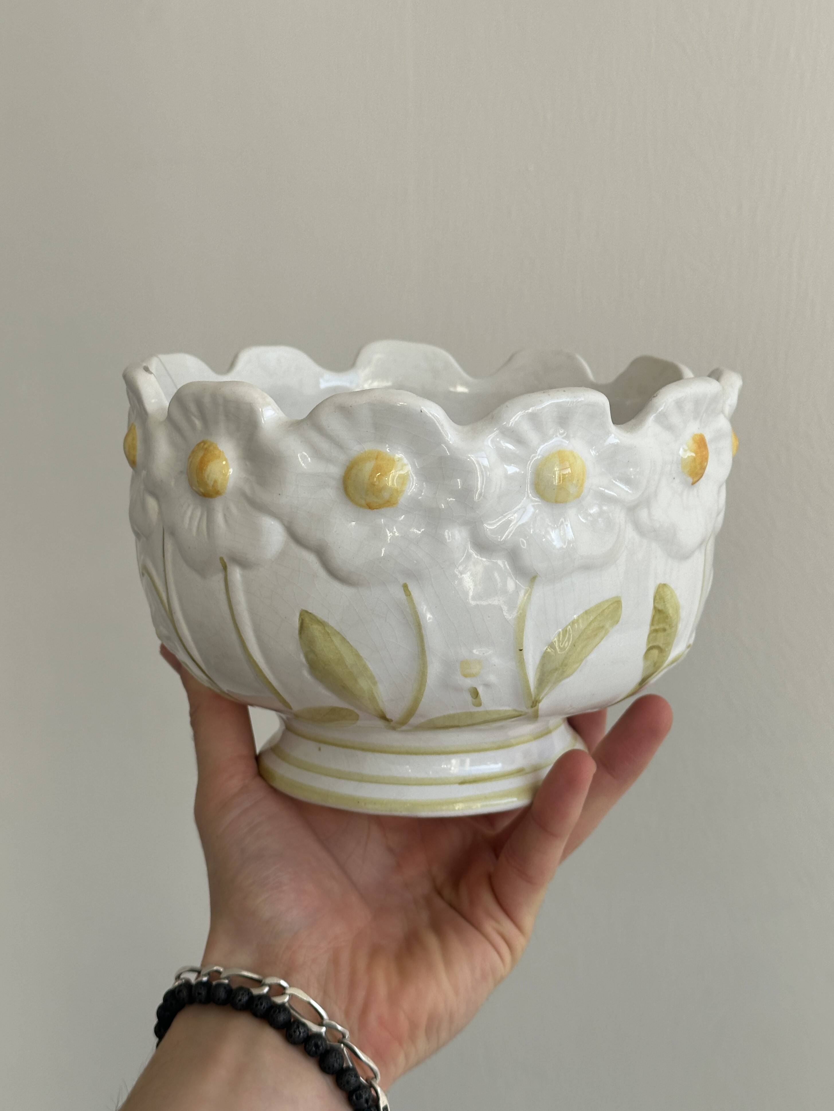 Antique slip pot cover, floral decoration