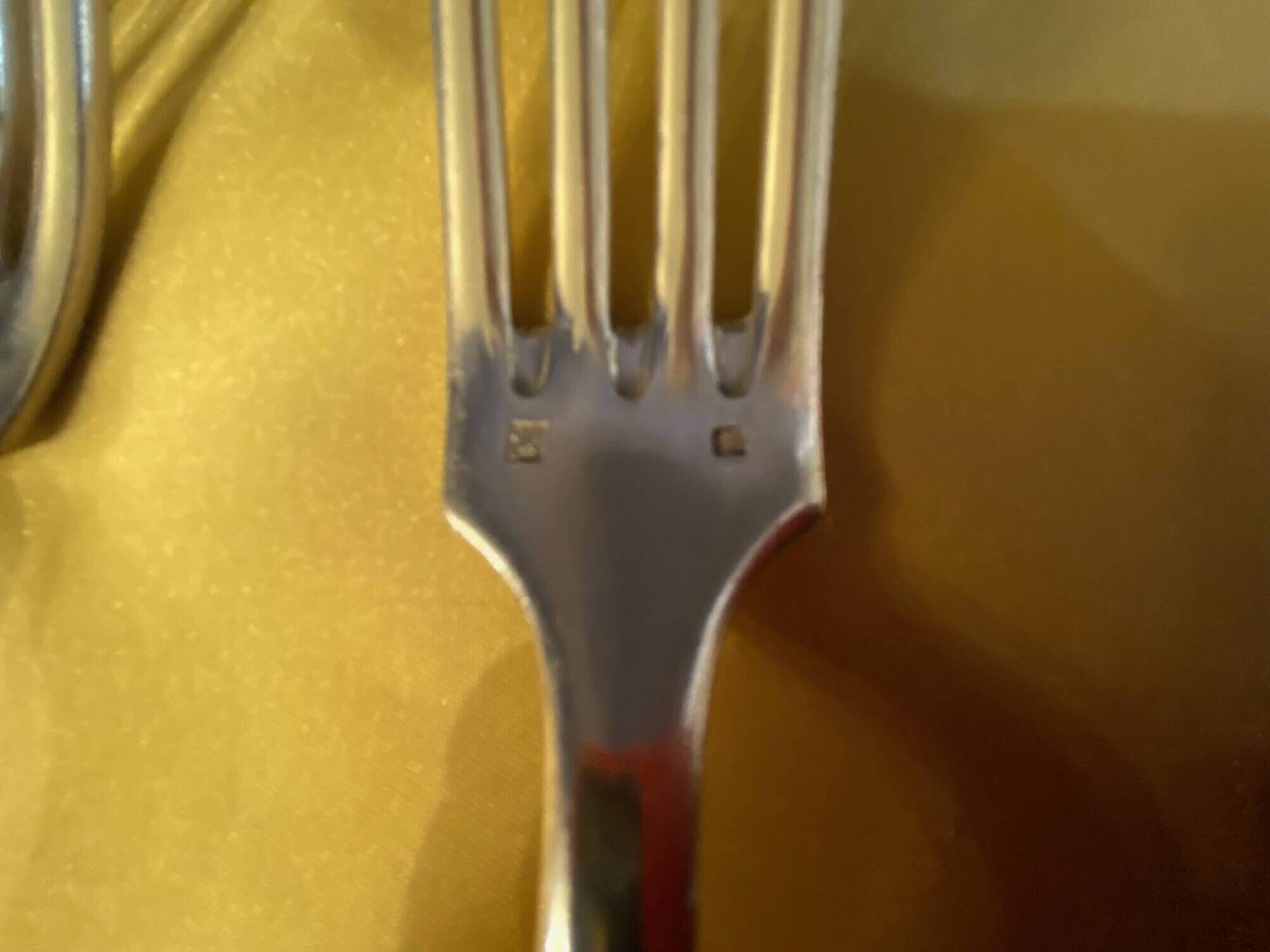 Series of 4 silver metal cutlery uniplat net model spoons forks