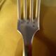 Series of 4 silver metal cutlery uniplat net model spoons forks
