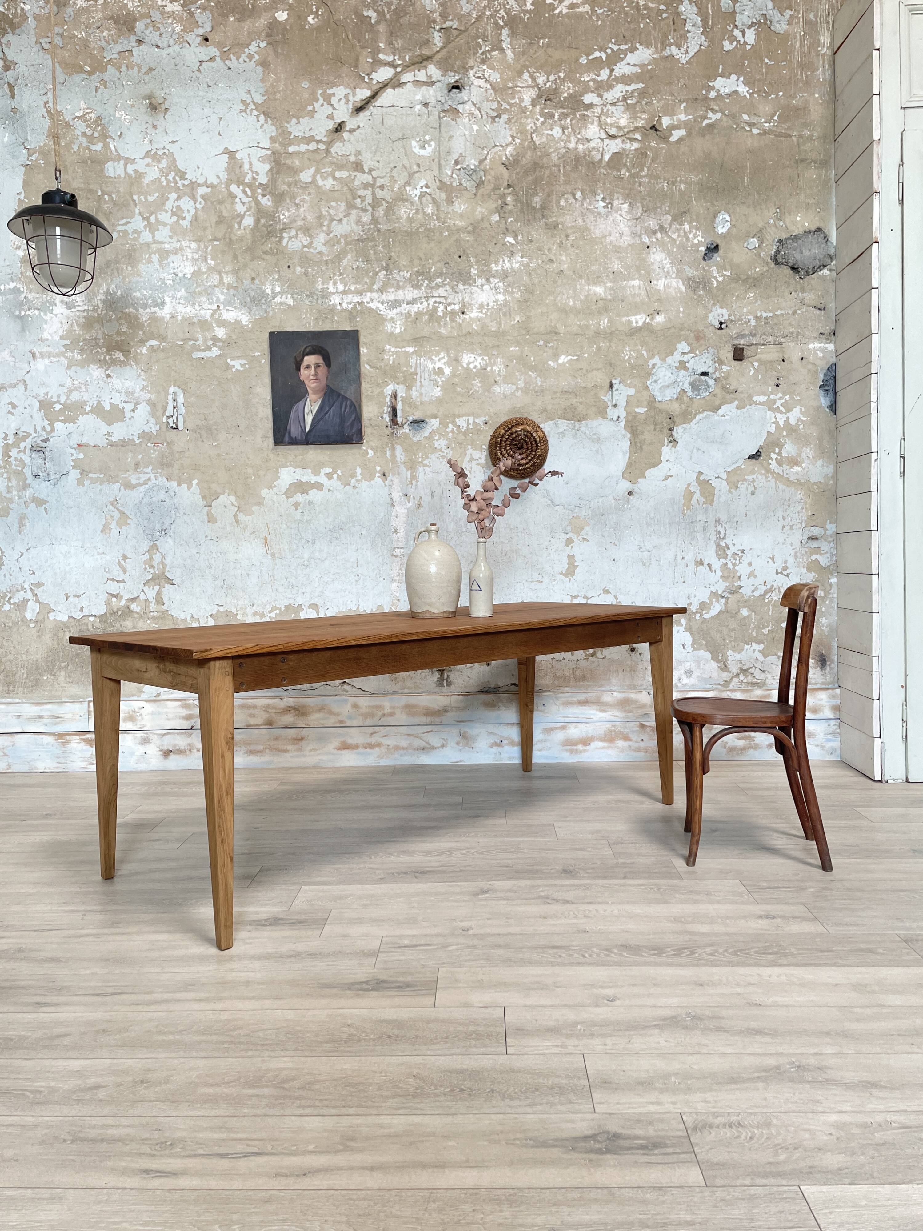 Vintage farm table with spindle legs.
