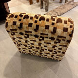 Vintage armchair from the 70s in beige and brown.