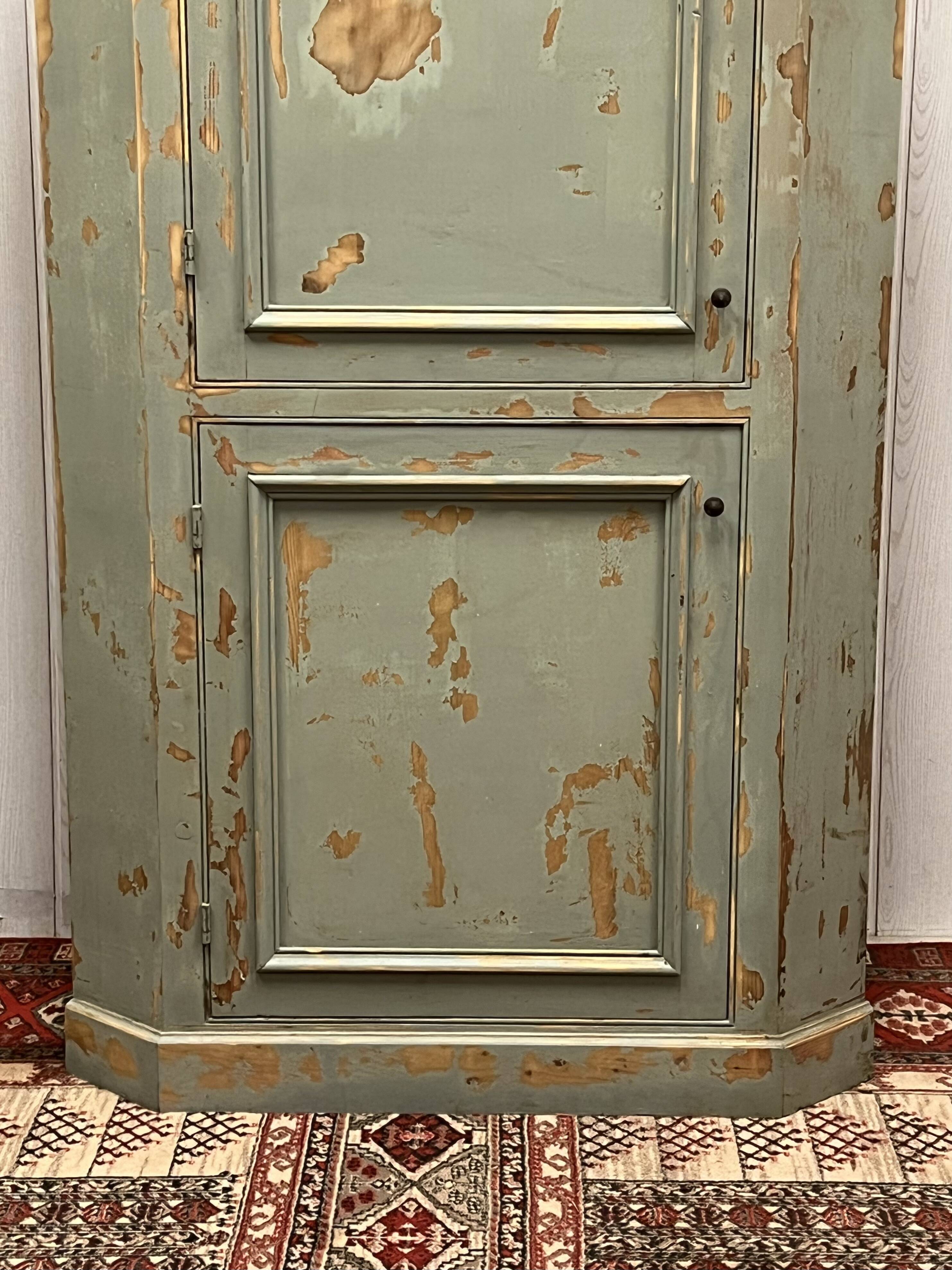Patinated corner cupboard