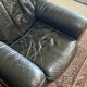 Pair of black leather club armchairs, twentieth century
