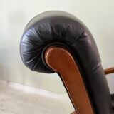 Black leather rocking Chesterfield armchair