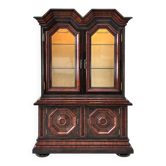 Antique display cabinet in wood, bevelled glass and velvet.