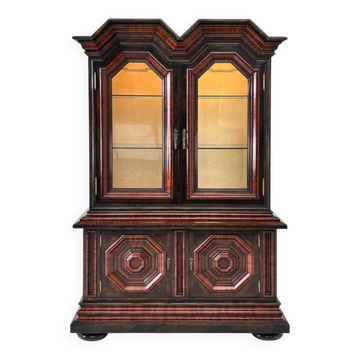 Antique display cabinet in wood, bevelled glass and velvet.