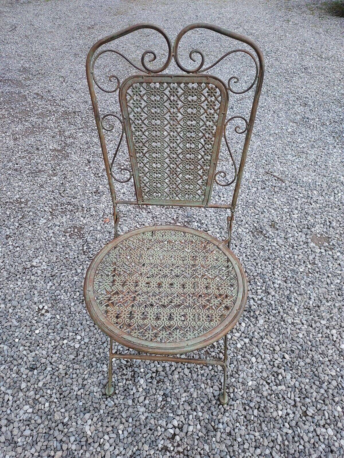 folding garden furniture in patinated iron