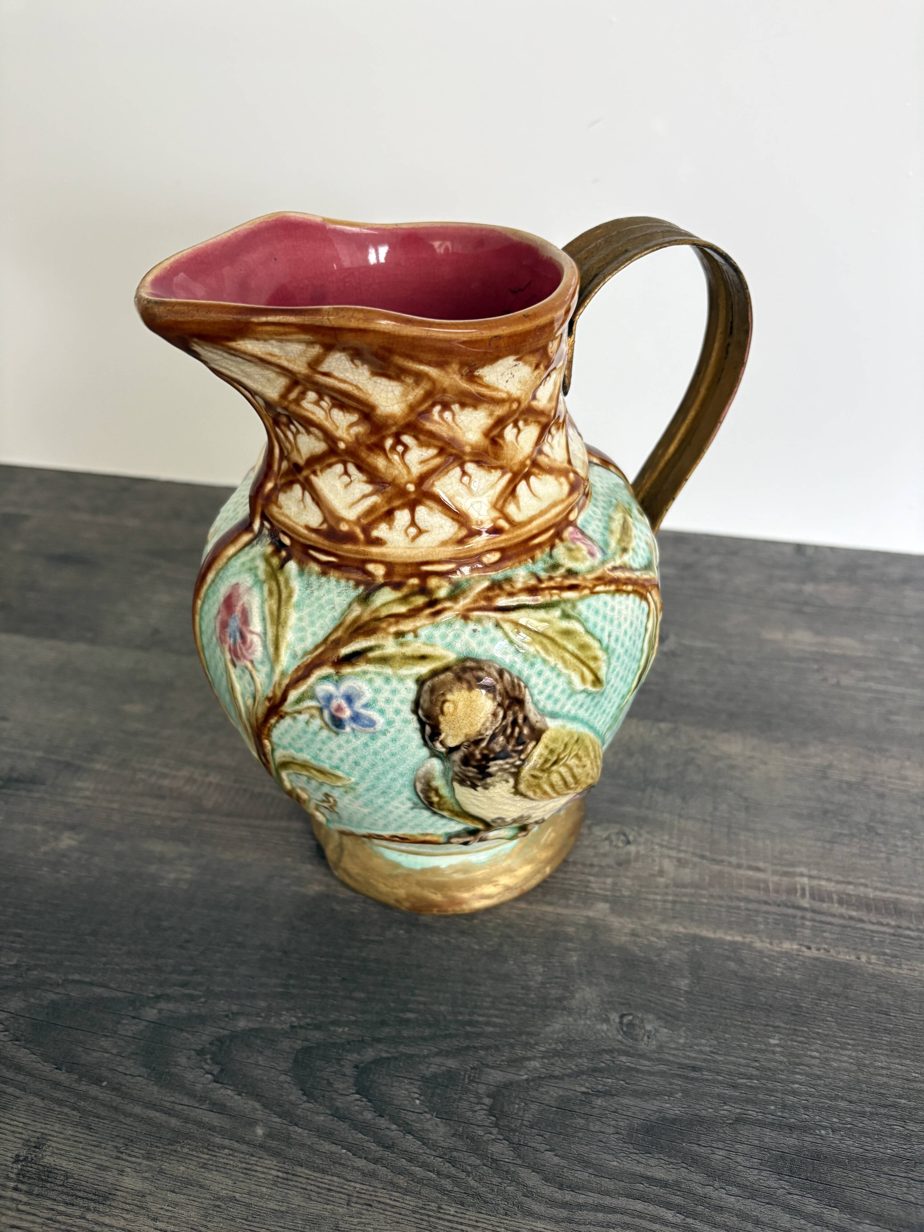 Pichet barbotine 19th century with bird decoration.
