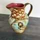 Pichet barbotine 19th century with bird decoration.