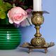 Antique carved bronze candlestick