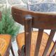 4 bentwood bistro chairs with a pattern on the seat