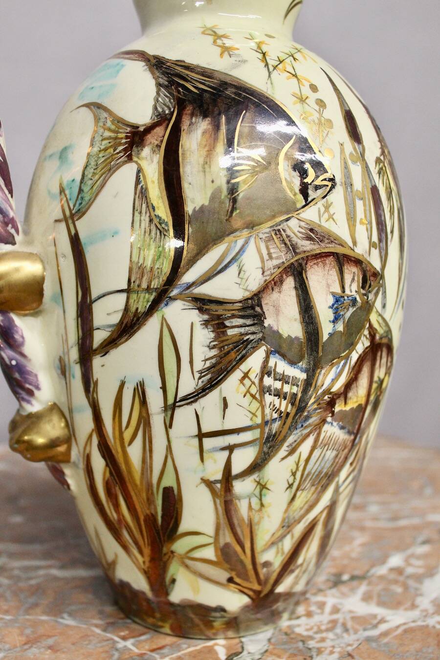 Ceramic jug with fish decoration