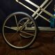 Vintage rolling trolley in gold metal & smoked glass – Retro elegance as