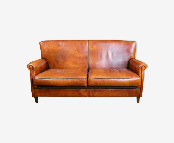 Vintage sheepskin leather 2-seater sofa in brown with dark trim