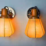 Pair of articulated "Cocoon" wall lights, resin and pine, Italy, 1970