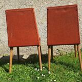 Pair of 1950s lounge chairs in oak and red moleskin.
