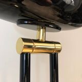 Floor lamp in black lacquered metal and brass