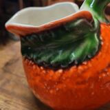 Orange slipware pitcher
