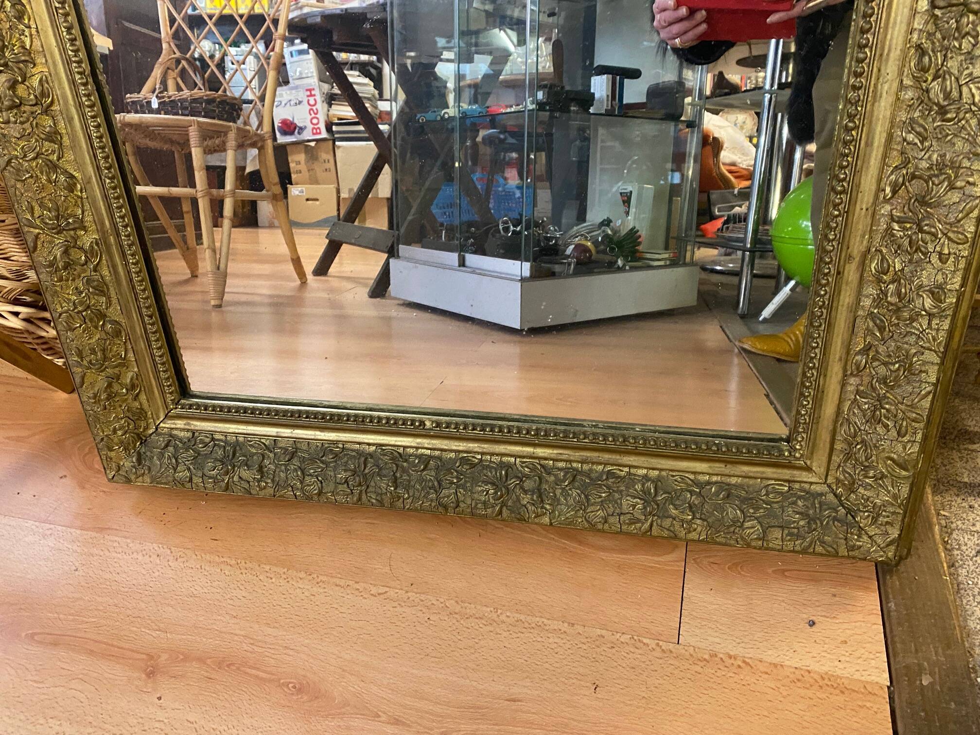 LARGE LOUIS XV STYLE ROCAILLE MIRROR IN GILT STUCCO FORAL DECOR ON PEDAL