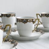 7 Limoges porcelain cups and saucers with gold decoration and floral motif.