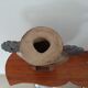 Oval/round pottery on base signed