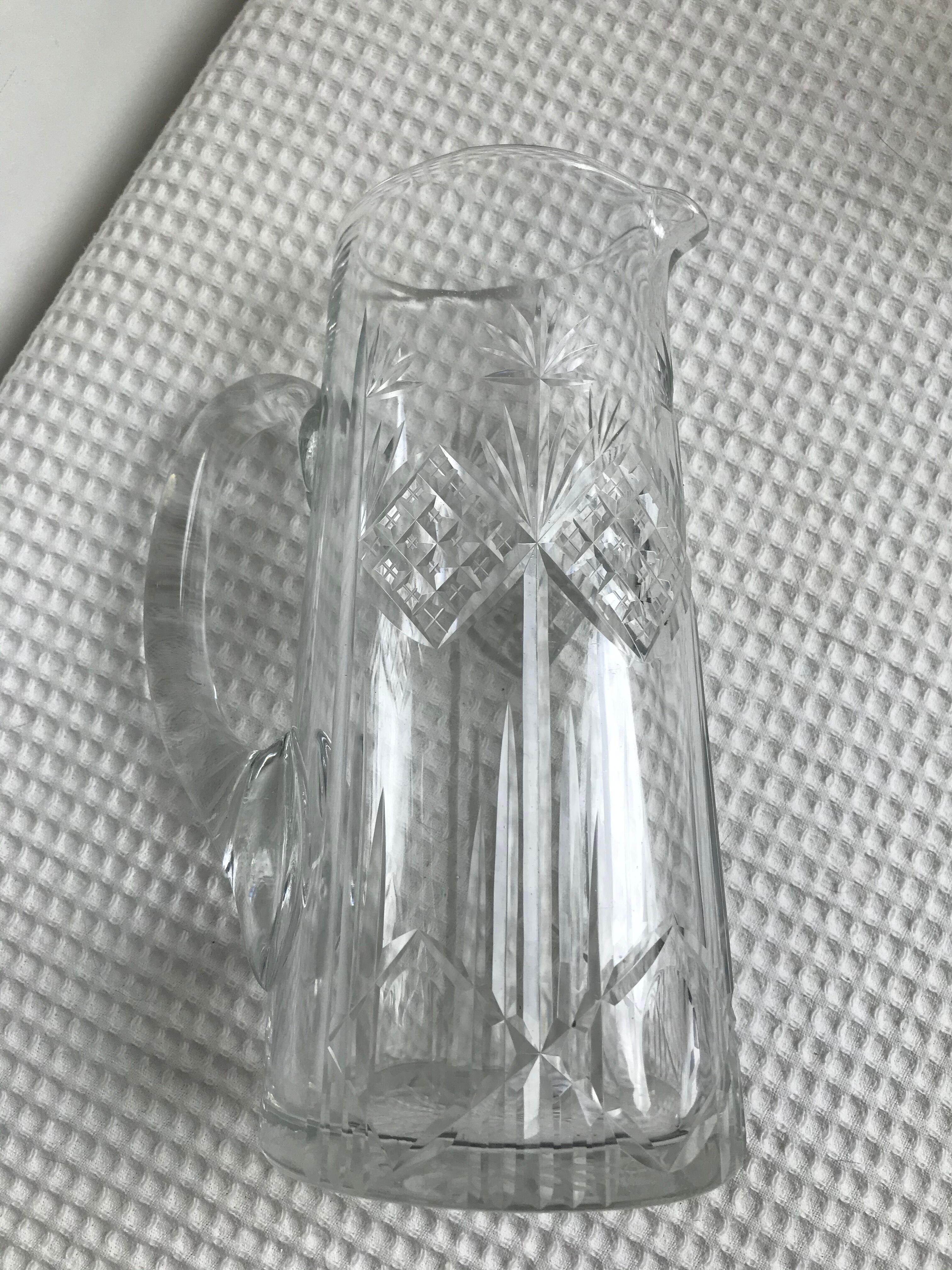 Engraved glass pitcher