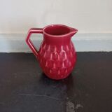 Small pitcher in old red earthenware