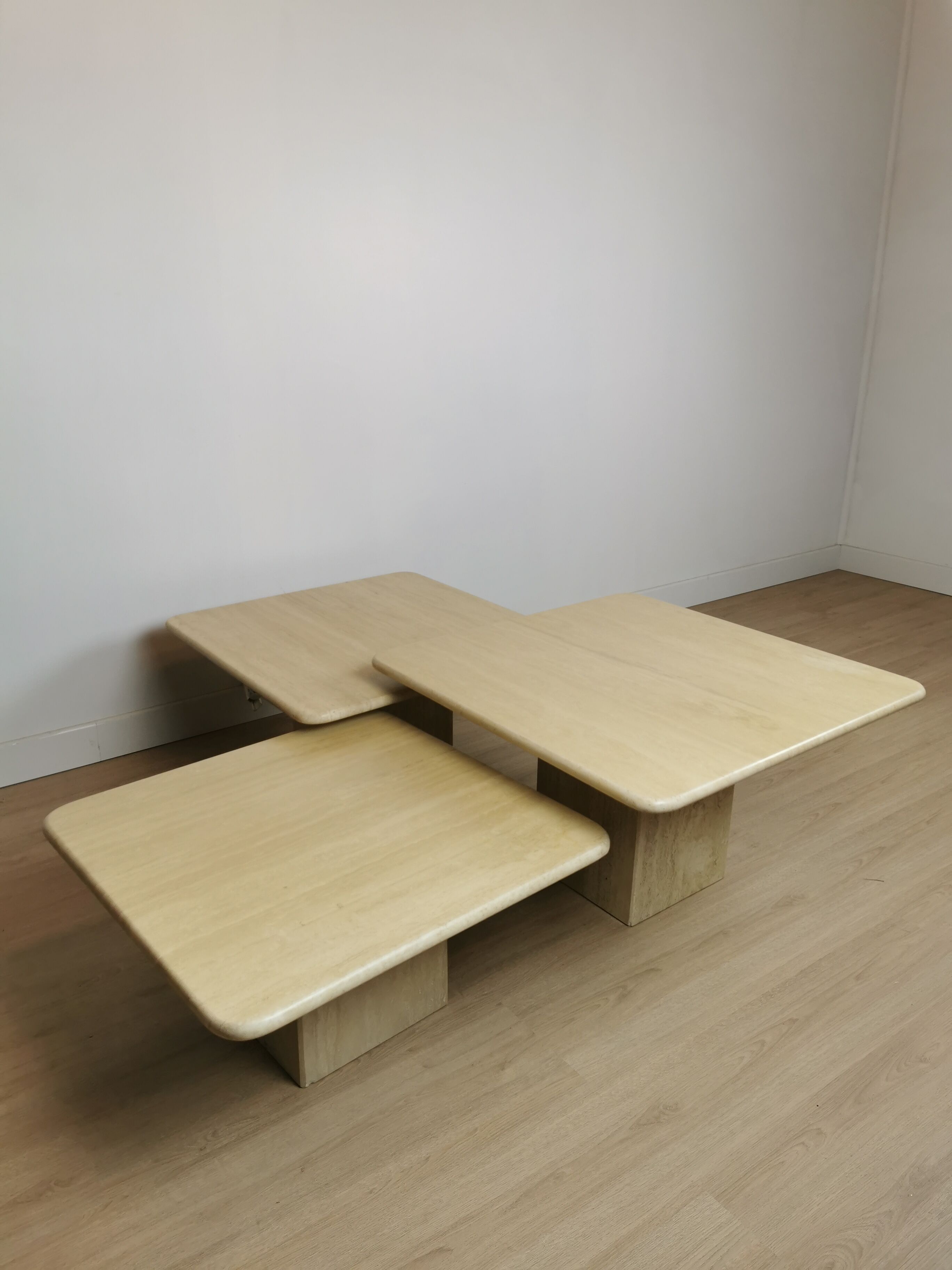 Side tables in travertine 70s