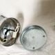 Vintage accordion wall light in chrome metal.