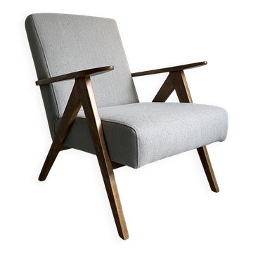 Fauteuil vintage mid-century moderne : tissu gris et cadre en bois de hêtre