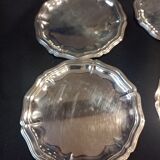 Four silver metal bottle bottoms