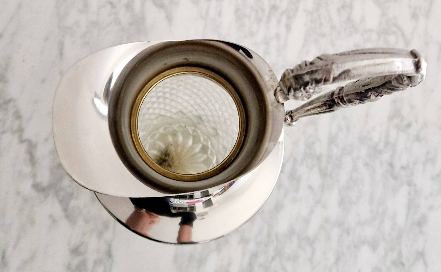 Glass and silver-plated carafe