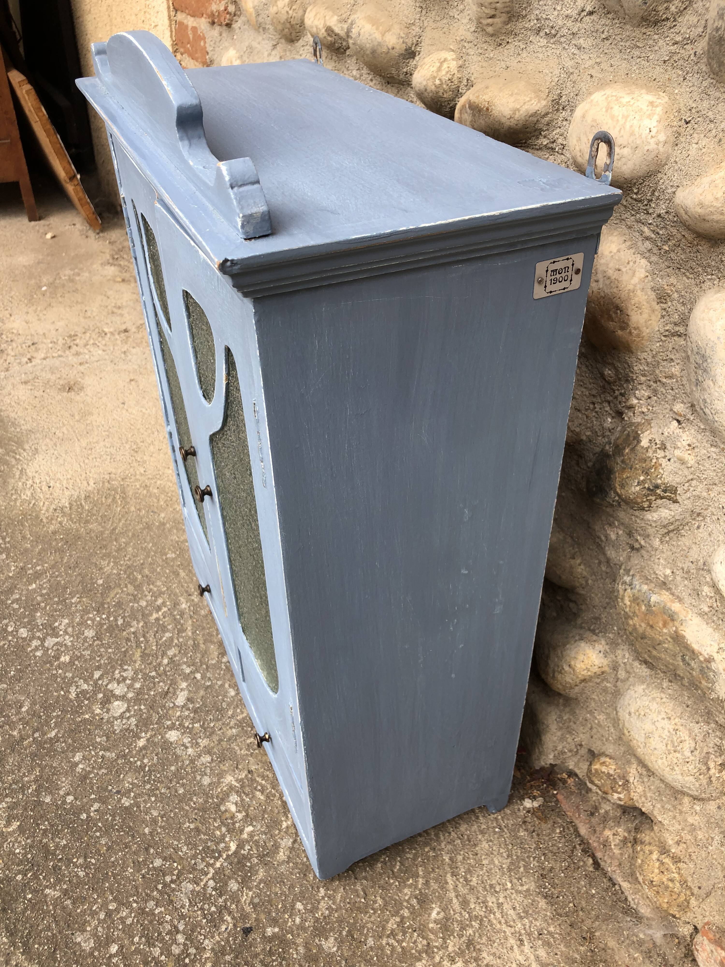 Pastel patinated medicine cabinet