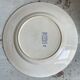 Set of numbered Terre de Fer St Amand plates (4 hollow and a flat plate)