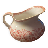 Old pitcher in red-decorated earthenware