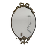 Antique mirror, oval with brass crest