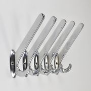 Up to 5 large Art Deco Bauhaus wall hooks in nickel and brass, Vienna, 1930s.