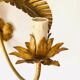 Golden palm leaf sconce