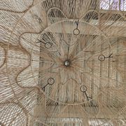 Huge rattan suspension in the shape of a corolla H:1m; D: 1m50