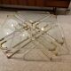 Coffee table and its 4 associated nesting tables in plexiglass and gold metal