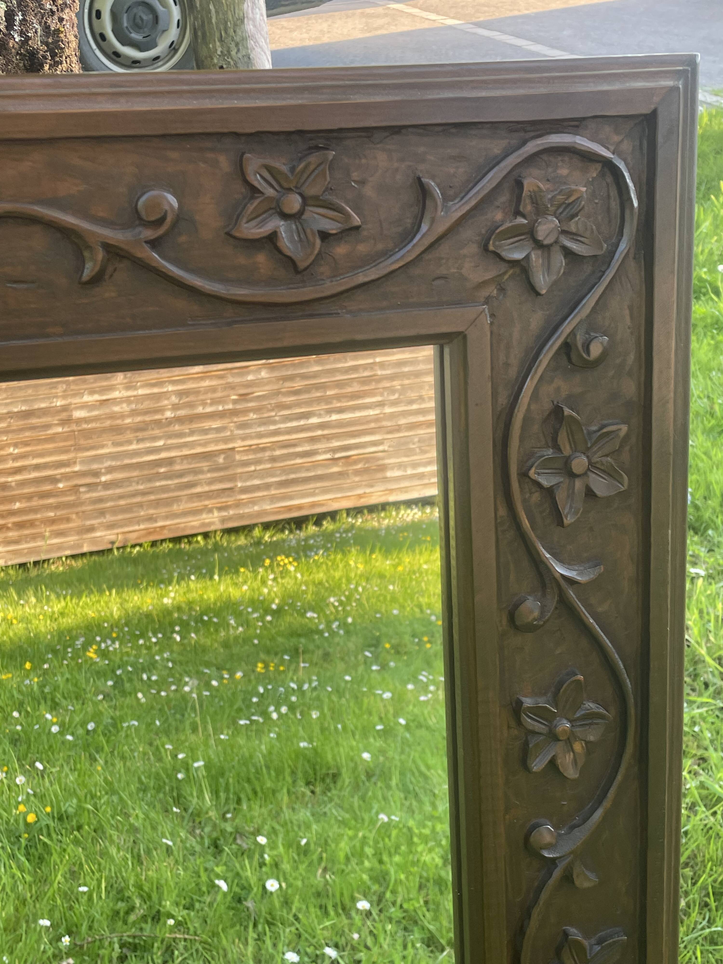 Large carved wooden mirror in Art Nouveau style