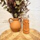 Vase en terre cuite visage