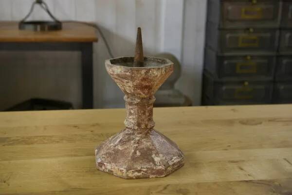 Pair of patinated cast iron candlesticks, 1940s
