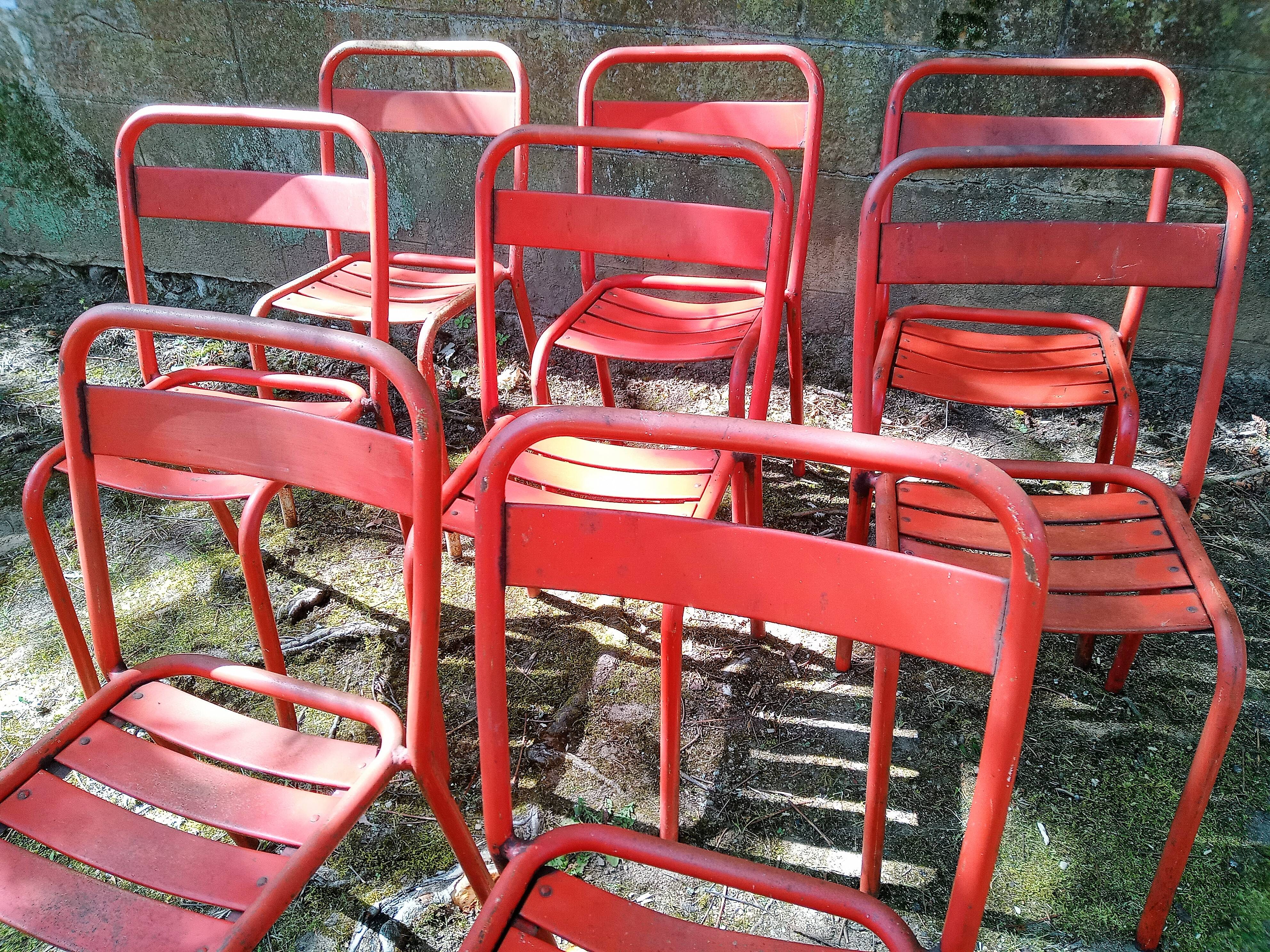 Series of 8 red Tolix chairs