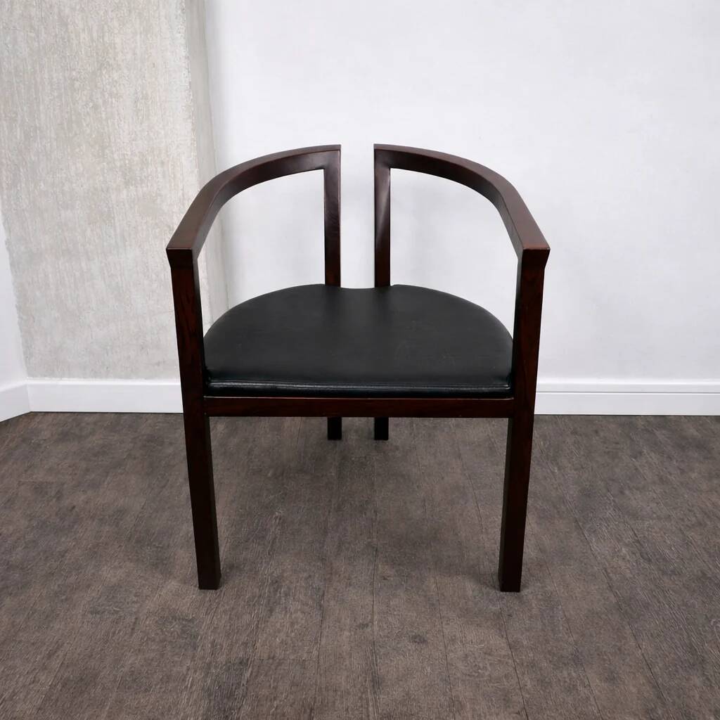 Armchair with armrests in rosewood and faux leather, Denmark, 1960.