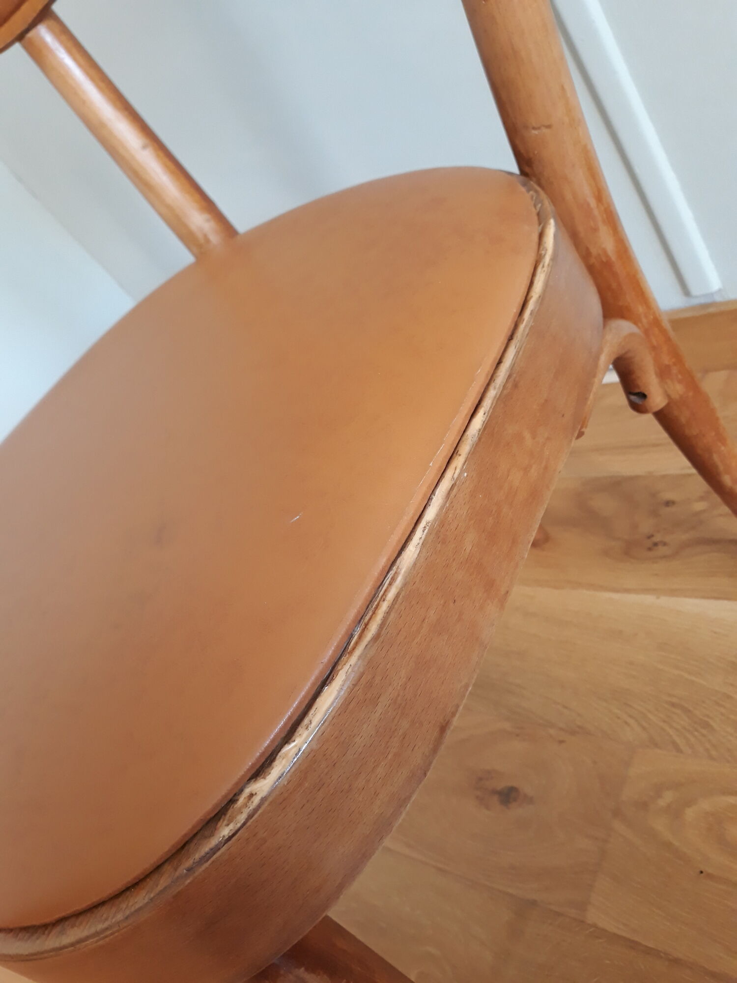 Bistro chair Baumann 1963 curved wood and skaï imitation leather caramel