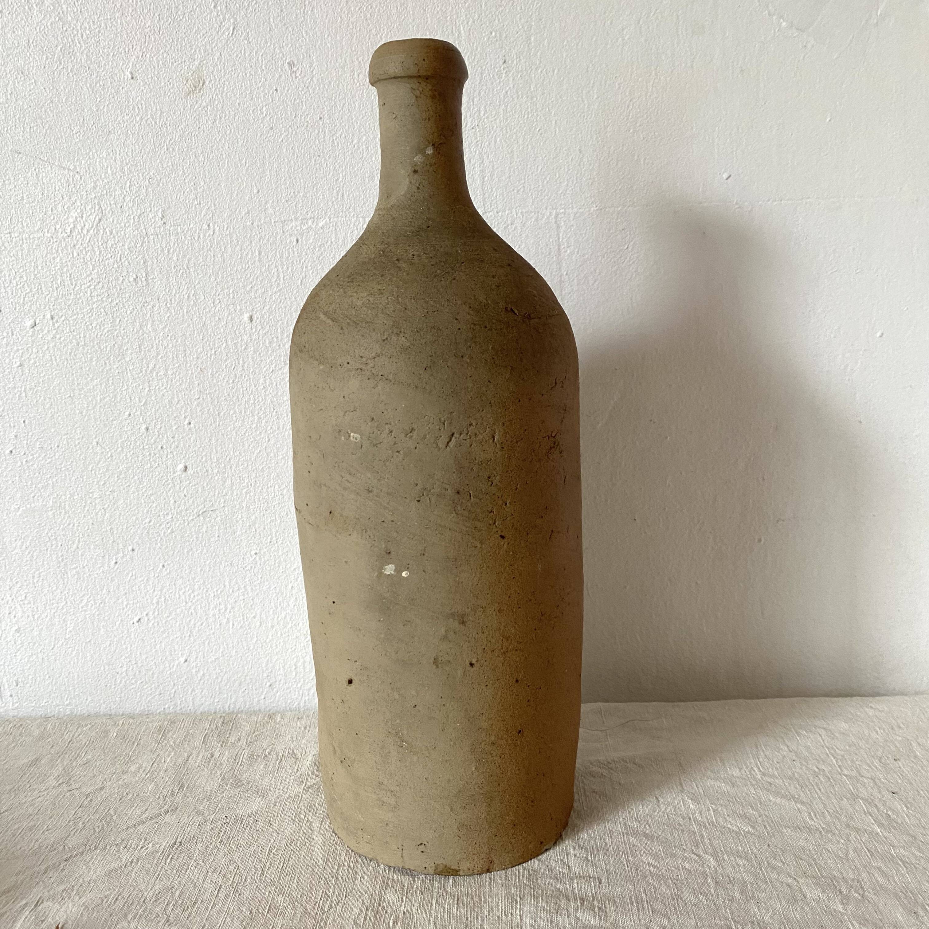 Old terracotta bottle